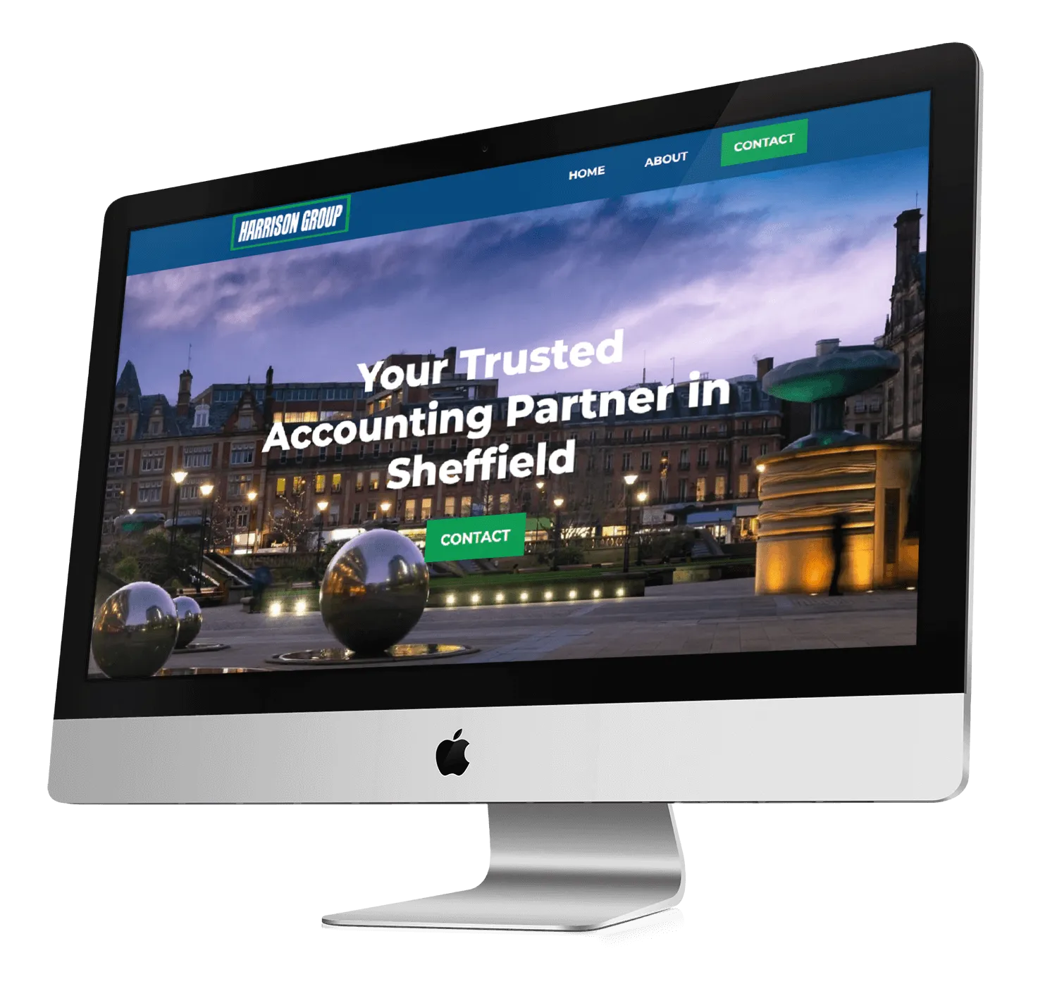An apple computer mockup of the Harrison Group's website